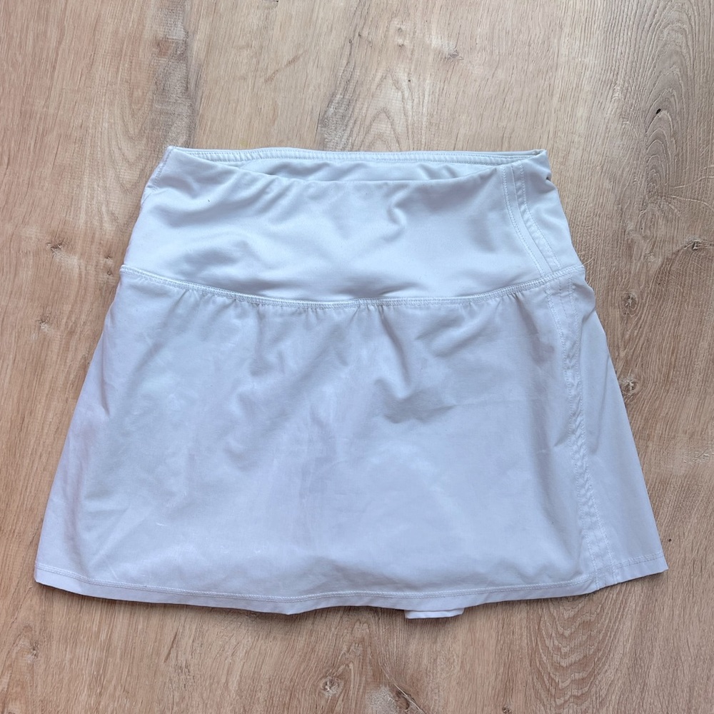 Pleated mini golf skirt
